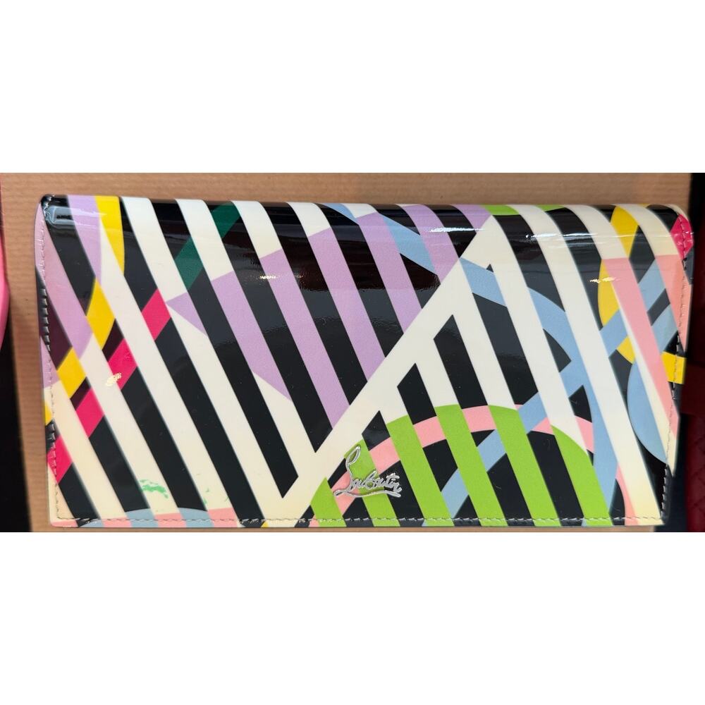 Christian Louboutin So Kate clutch features a vibrant multicolored geometric